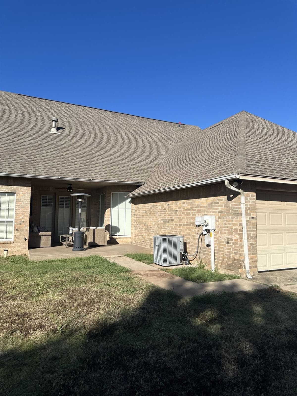 Full tear-off, new decking & architectural shingle roof by Artisan Roofing — Oklahoma City metro