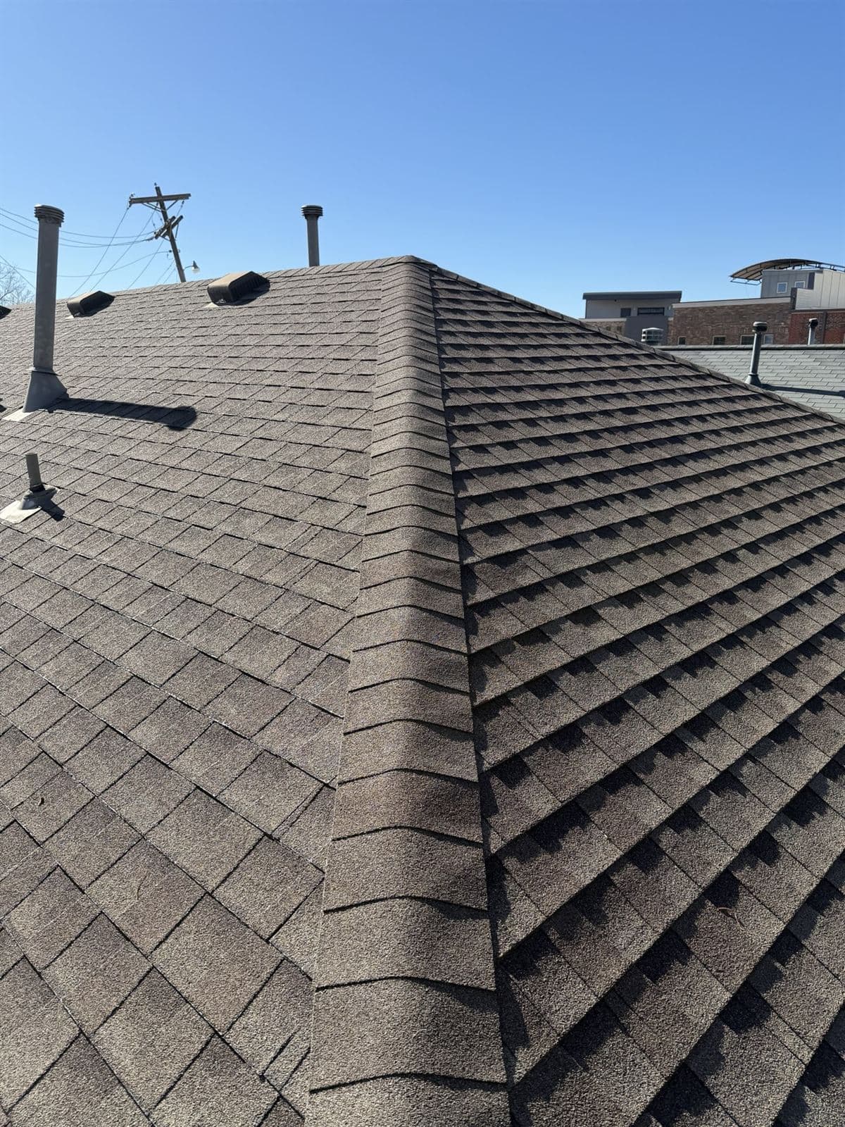 Storm-damage roof replacement — architectural shingles by Artisan Roofing — Oklahoma City metro
