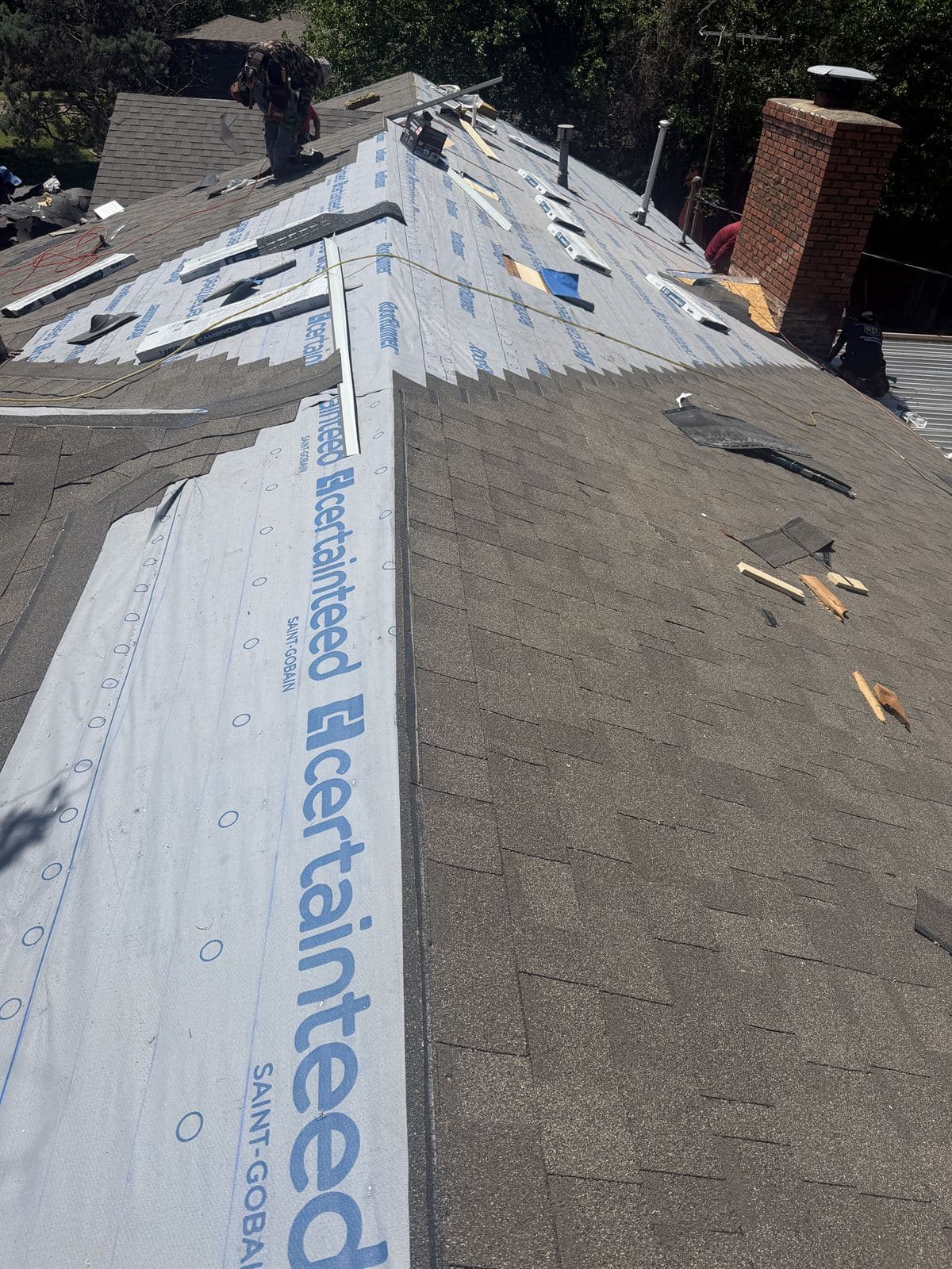 Re-roof with Owens Corning RhinoRoof underlayment & architectural shingles by Artisan Roofing — Oklahoma City metro
